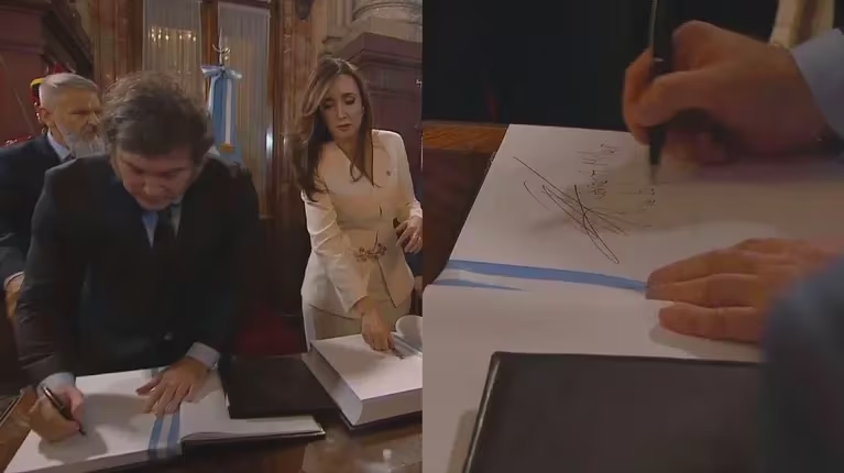 El momento de la firma de Javier Milei y Victoria Villarruel.